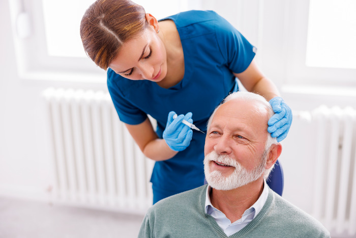 doctor applying dermal fillers to senior patient Facial Injection