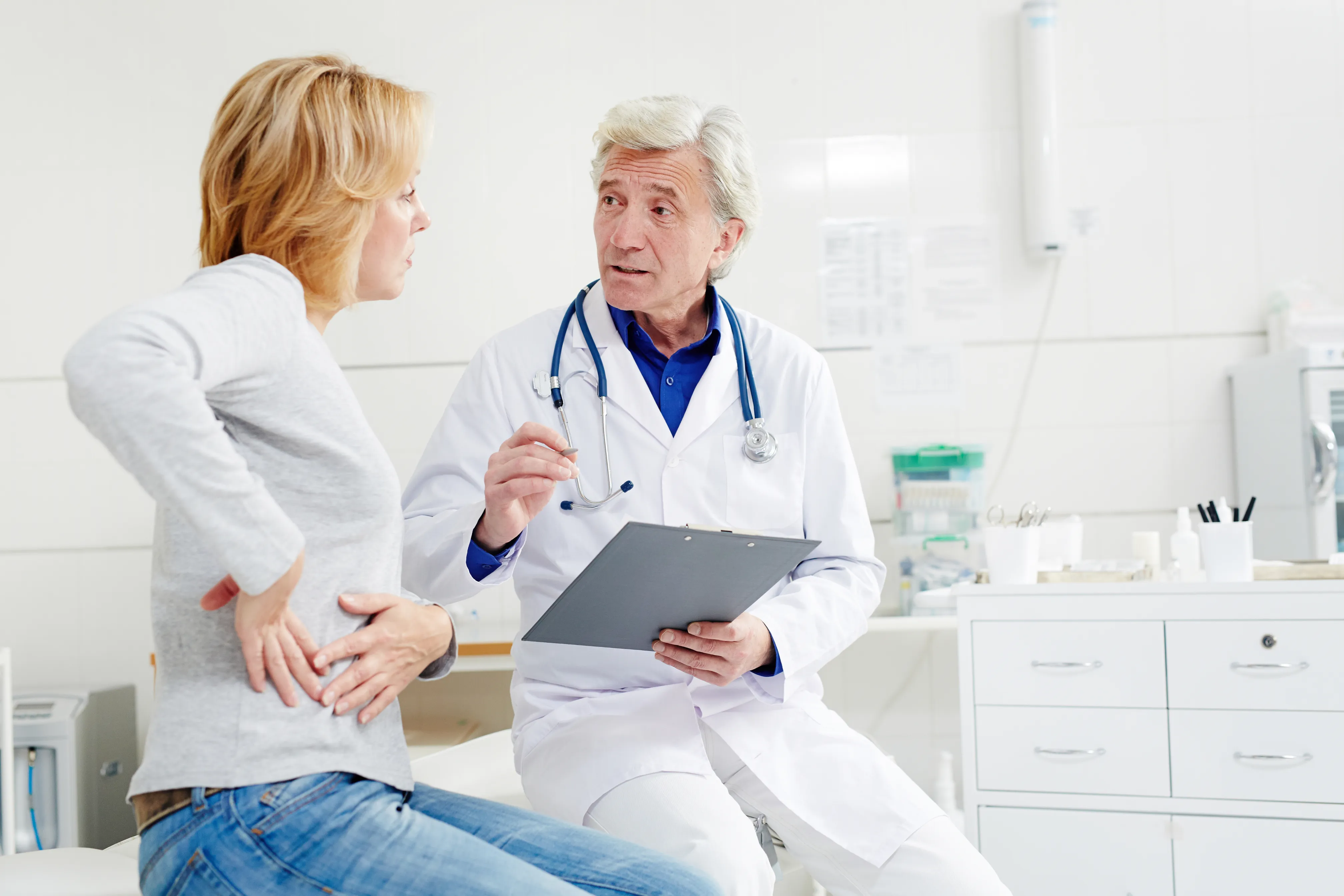 symptoms of gynecomastia